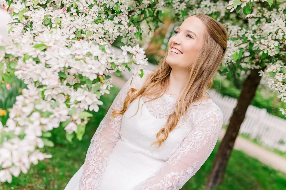 Confirmand among blossoming trees